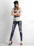 Фото #4 товара Женские джинсы скинни со средней посадкой укороченные рваные синие Factory Price
