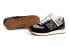 Фото #1 товара мужские кроссовки черные замшевые низкие New Balance  ML574DO