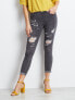 Фото #1 товара Женские джинсы скинни со средней посадкой укороченные рваные серые Factory Price