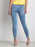 Фото #3 товара Женские джинсы скини со средней посадкой рваные укороченные голубые Factory Price